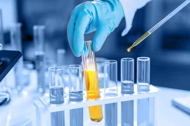 scientist with equipment and science experiments, laboratory gla