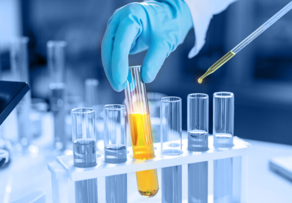 scientist with equipment and science experiments, laboratory gla